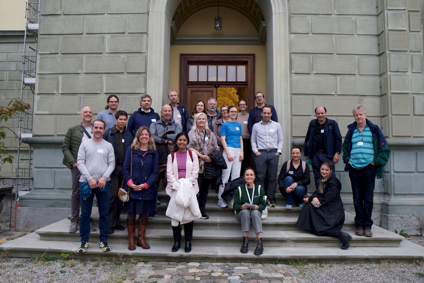 Happy group of alumni not yet aware of the exciting historical objects that await them